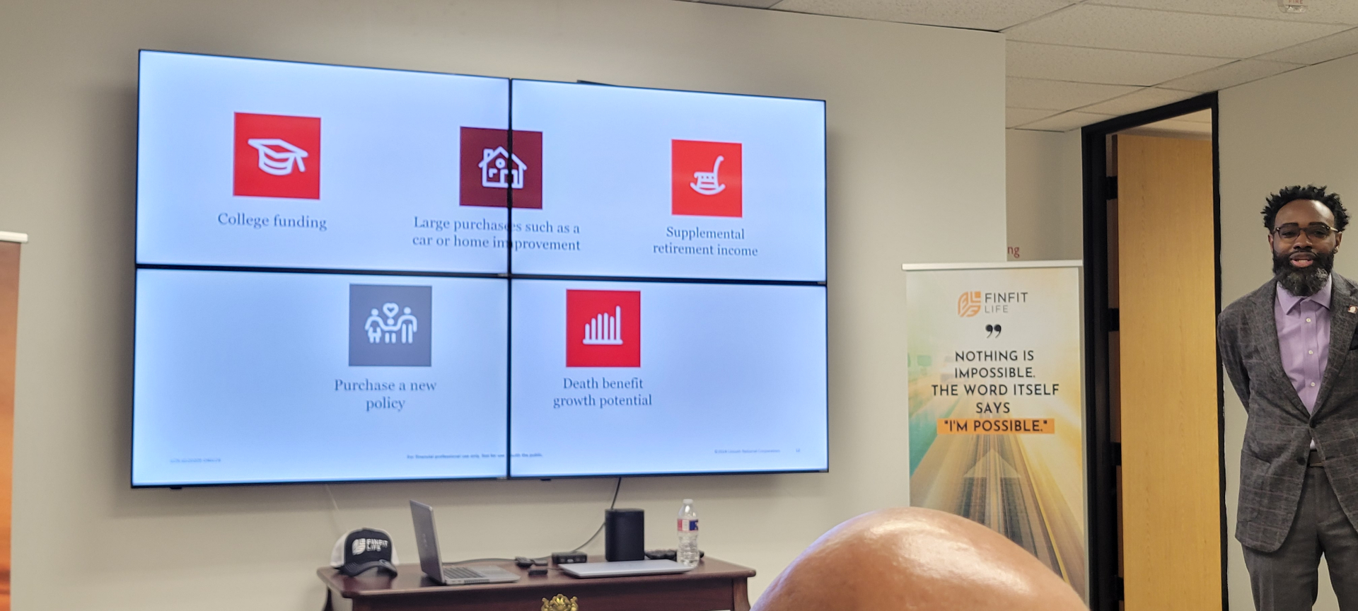 Corey Artisi educating an audience on holistic financial wellness